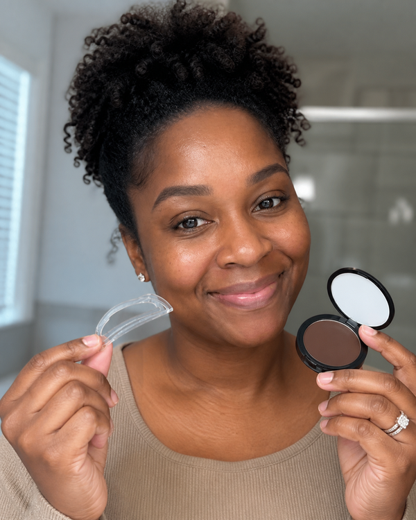Tasha W. holding the MYBROWS stamp applicator and powder compact